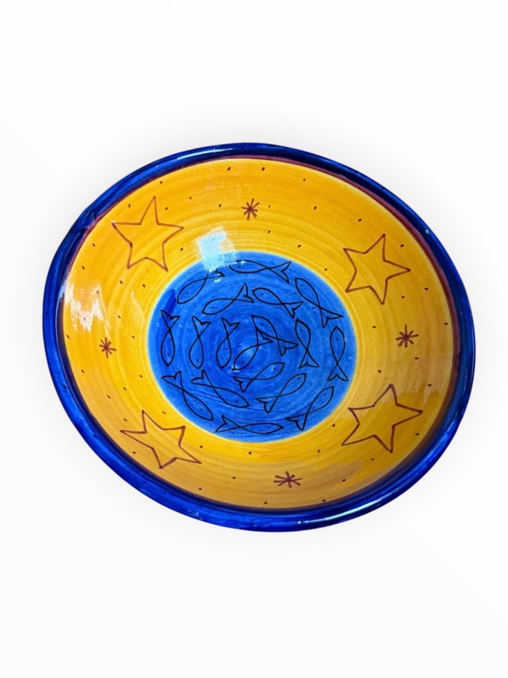 hand-painted Moroccan Safi ceramic bowl with fish and stars red clay pottery